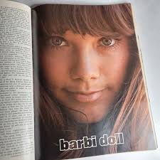 Framed Print of Hugh Hefner and his girlfriend Barbi