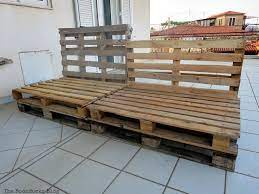 You'll need pallet wood and some creativity to build this sofa. Quickly Make A Super Easy Pallet Couch The Boondocks Blog