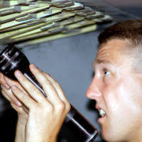 US Air Force (USAF) SENIOR AIRMAN (SRA) Jeremiah Bybee, a weapons loader  assigned to the 79th Fighter Squadron (FS), inspects aircraft forms