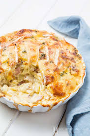 Tartiflette A Creamy French Casserole Of Potatoes Bacon Cheese Cream Recipe French Cuisine Recipes Recipes Food