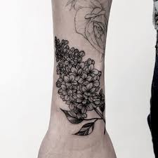 To highlight that idea, he dotted the petals and leaves. Your A Z Guide To Flower Tattoo Meanings Symbolisms And Birth Flowers Tattoo Ideas Artists And Models