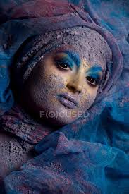 Woman with fantasy colorful makeup — beautiful, ultra violet