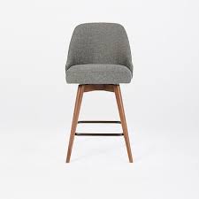 Add kitchen stools to a kitchen island and create additional seating with this guide from hgtv. Mid Century Upholstered Swivel Counter Stool