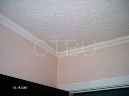 Step 5 pull out any nails or staples with a nail puller or pliers, or drive them in flush with a hammer. Diy Styrofoam Ceiling Tile Over Water Stained Popcorn Ceiling Hometalk