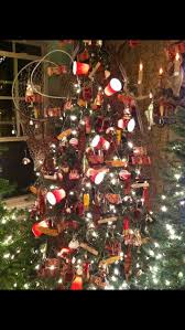 Hunting And Fishing Themed Christmas Tree Note The Red Solo Cup Lights Fishing Christmas Tree Christmas Tree Themes Fishing Christmas