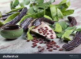 Carob Bean Harnup Healthy Organic Sweet Carob Pods With Seeds And Leaves On Wooden Background Ad Sponsored Healthy Organ Healthy Organic Carob Healthy