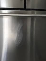 For visible scratches, there is not an approved repair method to cover the scratches. Refinishing Scratched Stainless Appliances