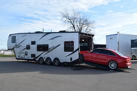 Check out our 5th wheel toy hauler selection for the very best in unique or custom, handmade pieces from our shops. Rv Toy Haulers Custom Enclosed And Open Trailers