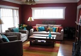 Spicy Dark Red Wall Color In A Mediterranean Room Color Scheme Red Living Room Walls Room Color Schemes Red Walls