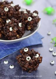 Not only are these a blast to make, but they will also be the hit of any halloween celebration. Easy Halloween Party Food Monster Chocolate Popcorn Balls Recipe Eats Amazing