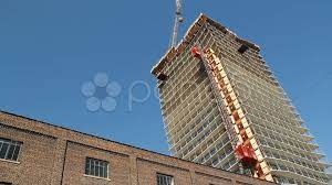 Timelapse Of Condominium Being Built In Toronto Ontario Canada Elevator Goes Up And Crane Lowers Bucket Old Brick B Stock Footage Old Bricks Brick Building