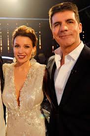And on tuesday, it seemed dannii minogue sported a new look on the red carpet of the marie claire awards in sydney. Dannii Minogue S Fling With Simon Cowell