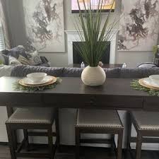 Rokane Counter Height Dining Table And Bar Stools Set Of 4 In 2020 Counter Height Dining Room Tables Counter Height Dining Table Counter Height Table Sets