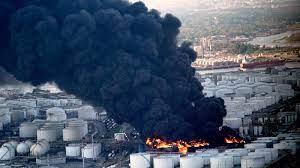Storage farm at houston's sprawling deer park refining complex. Pictures Of Petrochemical Fire Near Houston That Will Burn For Days Quartz