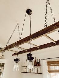 In this video i show you how to mount an extension ladder on your ceiling. Diy Ladder Chandelier Itty Bitty Farmhouse