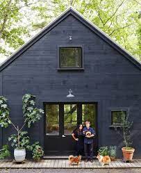 Another exterior element that is suitable to pair with a blue house with white trim is black shutters. 12 Dark Blue Houses Ideas House Colors House Exterior House Painting