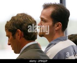 Christopher Neal Jeppson, right, stands with his attorney Scott Williams in  the courtroom of Judge Lynn W. Davis in Fourth District Court, Wednesday,  May 6, 2009 in Provo, Utah. Christopher Jeppson reached
