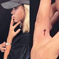It is very significant to have this design on the small finger of the left hand because the location. Sofia Richie Cross Finger Tattoo Steal Her Style