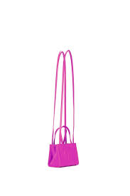 I named the album hot pink because i wanted people to feel that before they got into the music that it felt passionate, warm and i think that the colour hot pink describes those things the most. Telfar Releases A Hot Pink Version Of Its Shopping Bag Popsugar Fashion