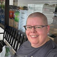 Photographer son takes pictures of high school band