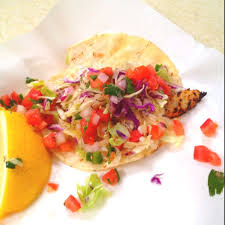 Grab one of their fish tacos, or their incredible fresh tuna poke and a bag of chips, add a fresh coconut drink right out of the shell, and enjoy the amazing view of the ocean on the outside patio. Eats