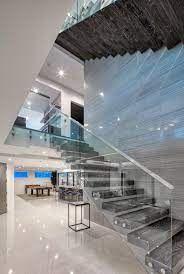 The combination is versatile and can be easily adapted to various locations. Modern Luxury Staircase With Glass Side Luxury Staircase Modern Staircase Stairway Design