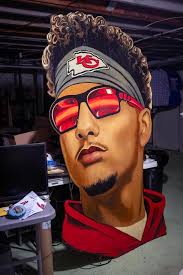 Riverside artist creates roadside art gallery of Kansas City Chiefs  superstars