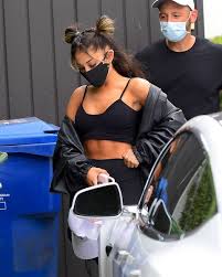 'i couldn't decide!' the grammy nominee looked like cinderella on the red carpet in a strapless tulle giambattista valli design. Ariana Grande Shows Off Abs While Leaving L A Gym