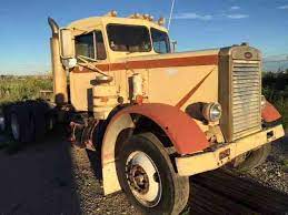 Finally got the truck in the shop doing some tinkering with it. Peterbilt Needle Nose 1964 Heavy Duty Trucks