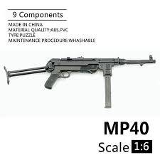 1 6 Mp40 Submachine Gun World War Ii Plastic Assembled Firearm Puzzle Model For 12 Soldiers Military Weapons Building Blocks Puzzle Model Model Puzzlemodel Firearms Aliexpress The mp 40 (machinepistole 40) was a submachine gun made and used around the world war ii period. 1 6 mp40 submachine gun world war ii plastic assembled firearm puzzle model for 12 soldiers military weapons building blocks