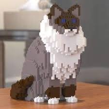 Cat playing with the statue of of the cat. 26 Lego Cat Sculptures Ideas Lego Sculptures Cats