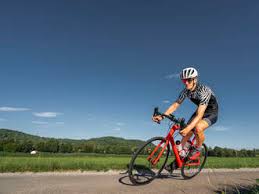 One race is all it takes to plant the seed of wanting a podium finish. Man Riding His Racing Bike Stockphoto