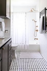 Black And White Modern Farmhouse Bathroom Modern Farmhouse Bathroom Black And White Vintage Floor Tiles Lead Past A Black Bath Vanity Adorne Remodel Shower Stall Black Bathroom Bathroom Remodel Shower