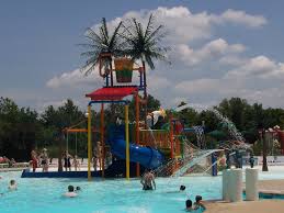 Retaining walls, walkways, patios, decks, ponds and fountains, landscape lighting. Chesterfield Family Aquatic Center Counsilman Hunsaker