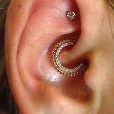 This Is The Most Stunning Clicker And Daith Piercing Piercing By App Member Tiffany Diamond Dv8 Body Body Jewelry Nose Daith Piercing Daith Piercing Jewelry