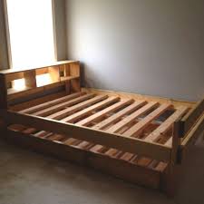 Instead, it consists of a wooden platform and a mattress, sometimes with side rails, a headboard consider things such as baseboard heaters, outlets and the thickness of your mattress when deciding how tall to build the platform. Full Size Bed With Built In Headboard Shelf And Twin Trundle Solid Wood Built To Last As Shown 500 Headboard With Shelves Trundle Bed Frame How To Make Bed