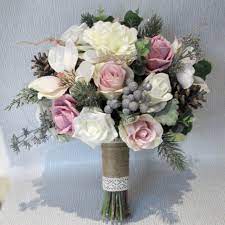 To make the most of your wedding flower funds, read flowers make a beautiful wedding centerpiece; Christmas Winter Wedding Bouquets