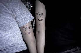couple rear arm name tattoo arka kol sevgili isim dovmesi cift dovmeler sevgili dovme dovme