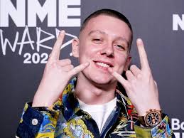 Aitch vows to 'fix' situation after Ian Curtis mural covered with album  advert