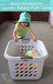 Sensory Processing Play Laundry Basket Push Game Proprioceptive Activities Sensory Activities Toddler Activities