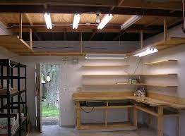As you can see from the pictures of our diy corner shelves, i also went out of my way to avoid a support post at the crux of the l shape to maximize usable space. Best Garage Workbench Ideas Home Interiors Garage Work Bench Garage Workshop Shed Workbench Ideas