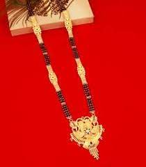 The gold locket usually designed into a heart shape with photo placed inside the locket. Mangalsutra à¤® à¤—à¤²à¤¸ à¤¤ à¤° Design Latest Long Short Mangalsutra Designs Online