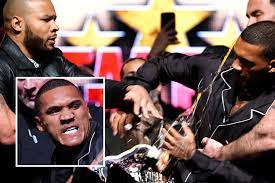 Chris Eubank Jr slaps Conor Benn with an EGG as bitter rivals pulled apart  in explosive Battle of Britain face-off | The Sun