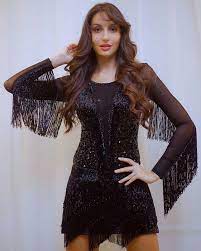 image may contain 1 person standing nora lovely bollywood girls beautiful indian actress