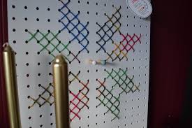 I like to find the center square to make sure it is centered well. The Christmas Cross Stitch Pegboard Well I Guess This Is Growing Up