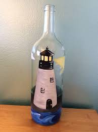 Lighthouse Painted Wine Bottle By Vino Vernici Wine Bottle Diy Crafts Hand Painted Wine Bottles Wine Bottle Crafts
