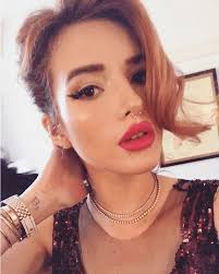 Bella Thorne Gets Matching Foot Tattoos With Dani Thorne