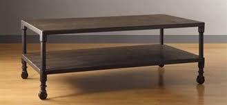 Created in mexico during the midcentury period, this this beautiful dark brown rustic coffee table or low table originates in spain and dates circa 1750. Rustic Wood Metal Coffee Table W Rolling Casters