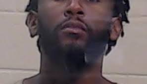 Armed robber gets 80 years; disrupts courtroom