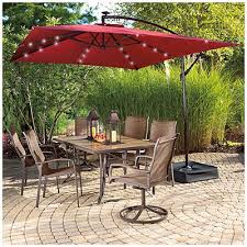 Wilson Fisher 8 X 11 Rectangular Offset Umbrella With Base And Solar Lights Rectangular Umbrella Offset Umbrella Offset Patio Umbrella
